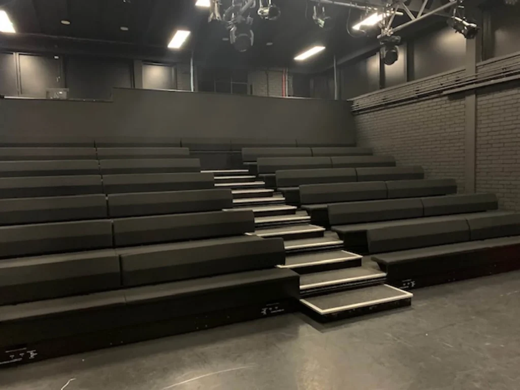 Empty auditorium cleaned to perfection by Spotclean Ltd's Barking services.