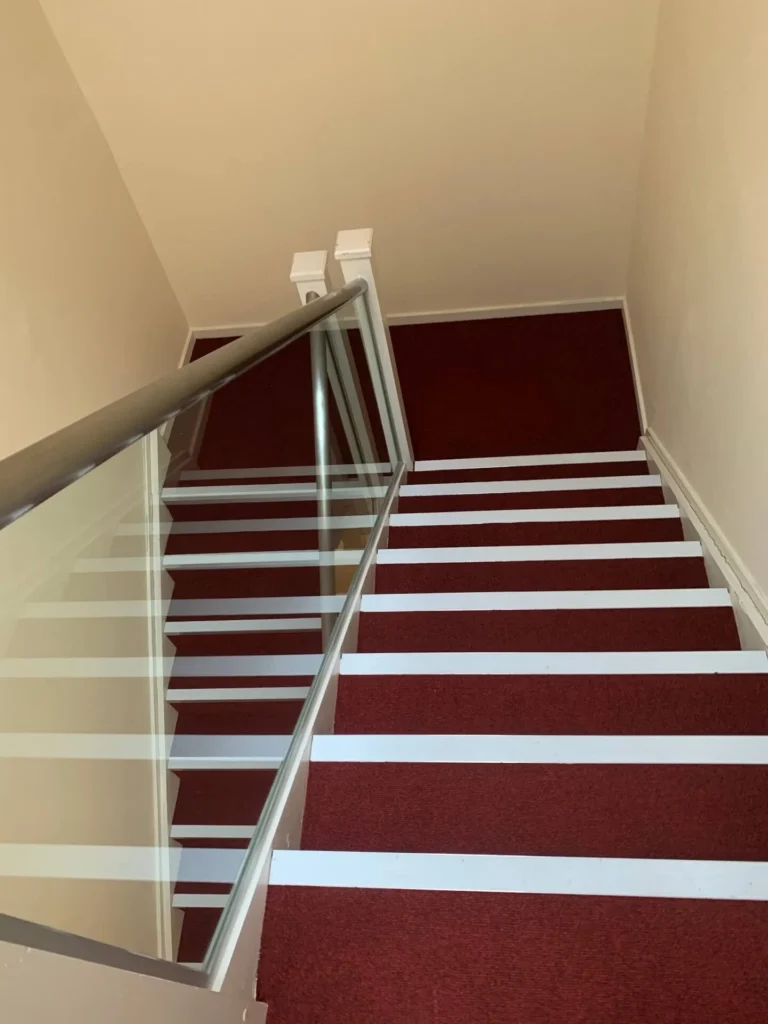 Spotless staircase showcasing Spotclean Ltd's commercial cleaning in London.