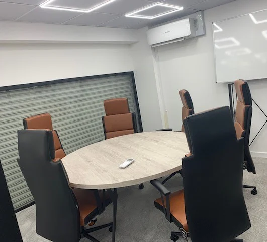 Clean conference room in Barking, maintained by Spotclean’s commercial services.